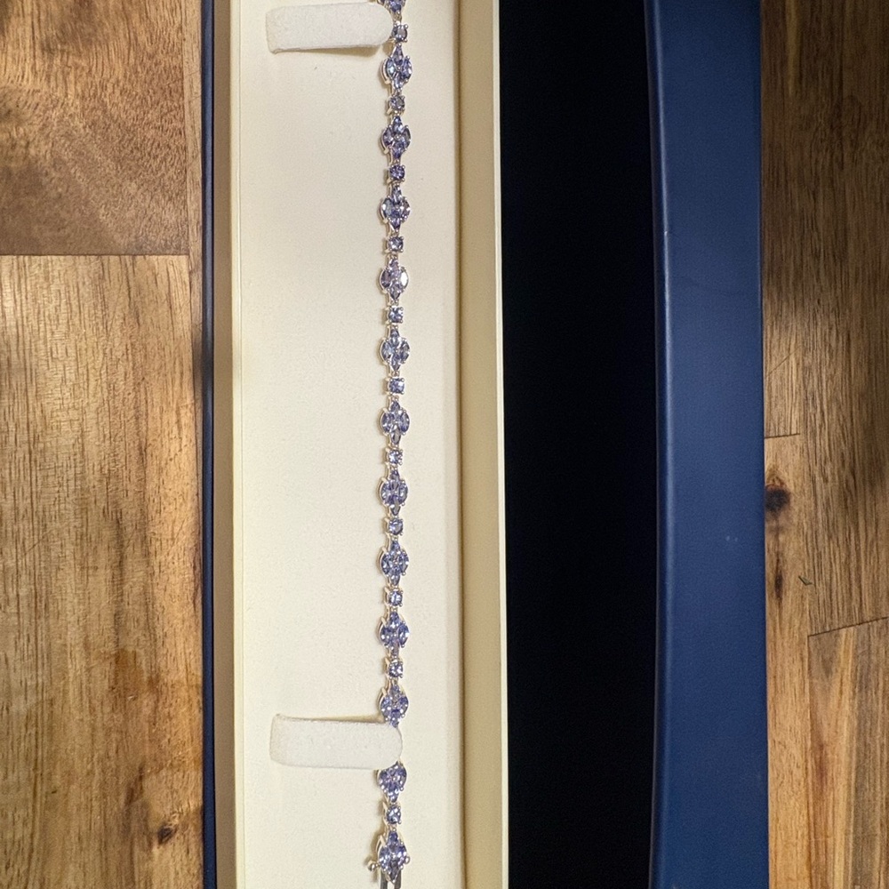 Dazzling sterling silver Tanzanite bracelet with tanzanite stud  earrings.